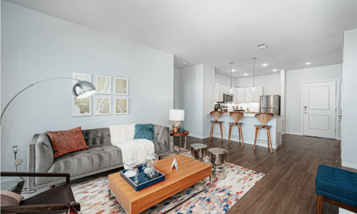 Modern apartment living room featured in virtual tours at Pointe at Polaris apartments in Columbus, OH
